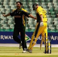 Wasim Akram of Pakistan celebrates the wicket of Matthew Hayden of Australia